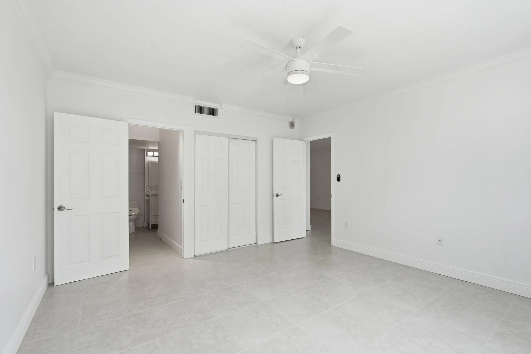 Bedroom to Living room View - White Tile throughout