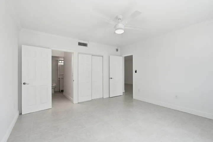 Bedroom to Living room View - White Tile throughout