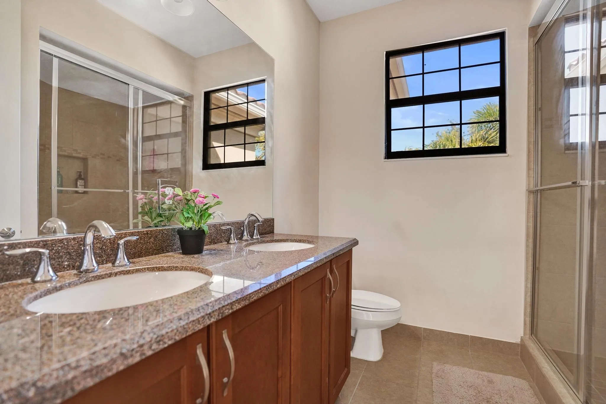 Full bath double sinks, walk in shower located off 2 bedrooms