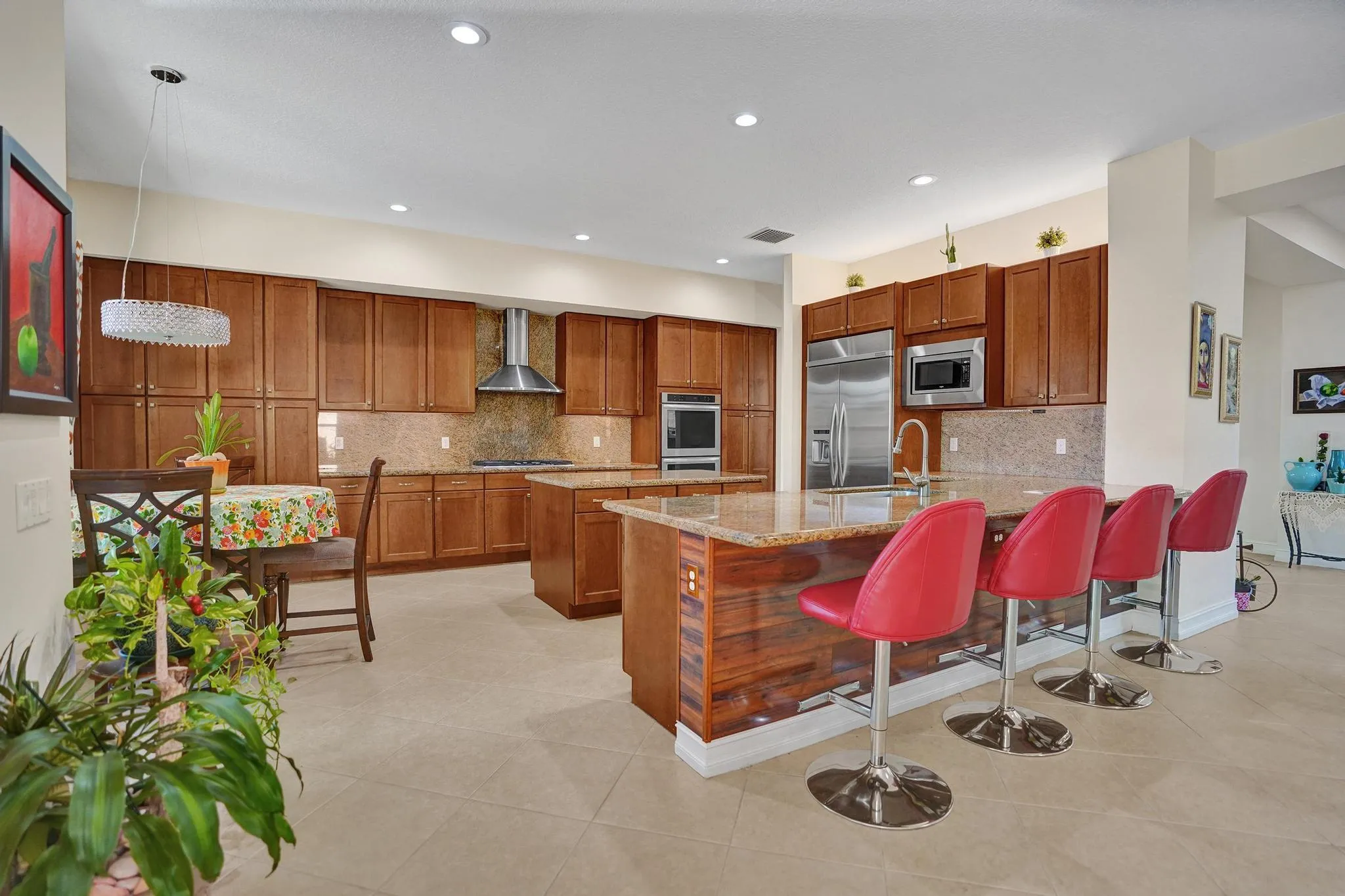 Breakfast area and counter bar serves family and frients in custom kitchen