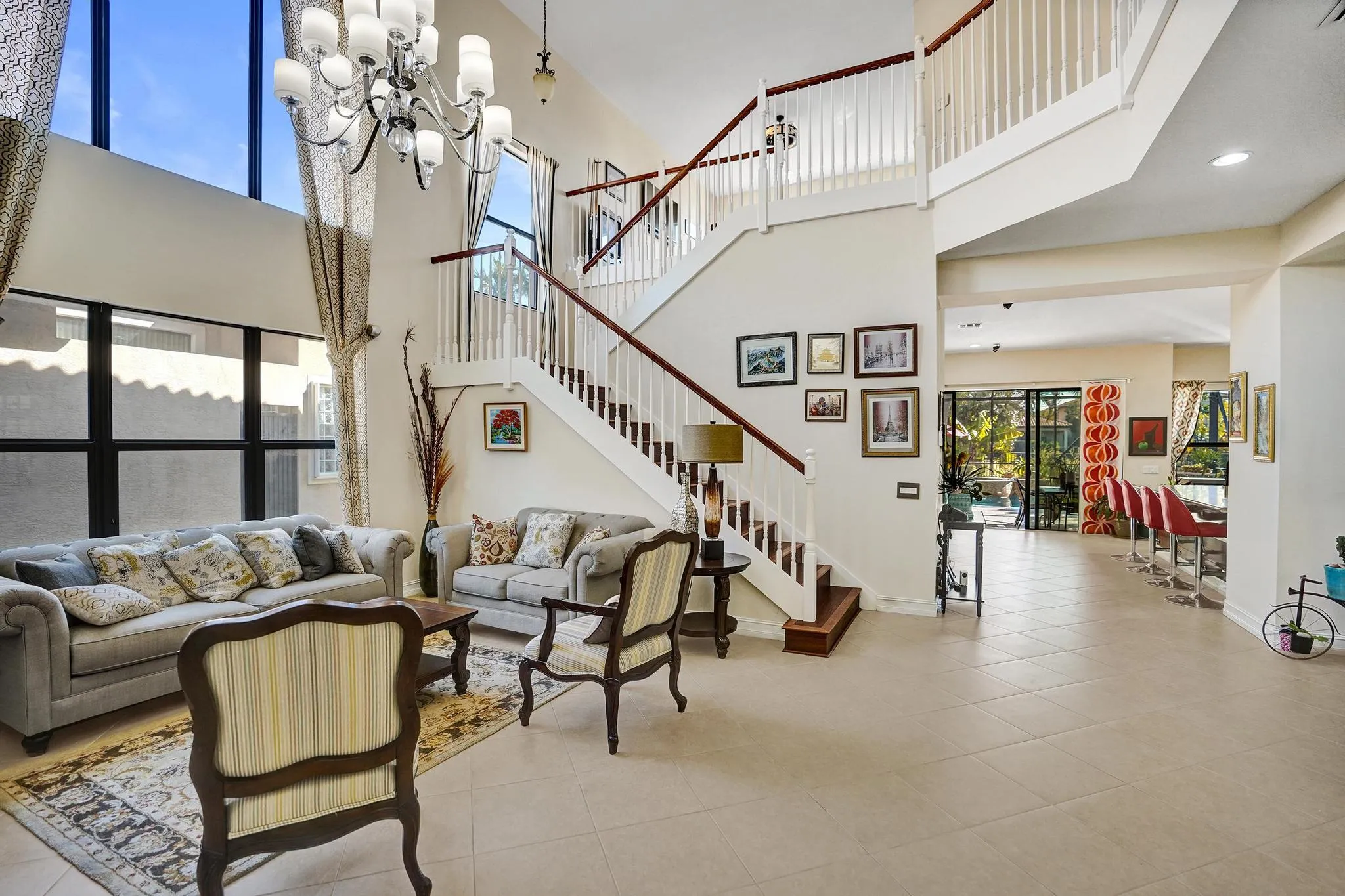 Soaring Ceiling and floor to ceiling windows natural light energy