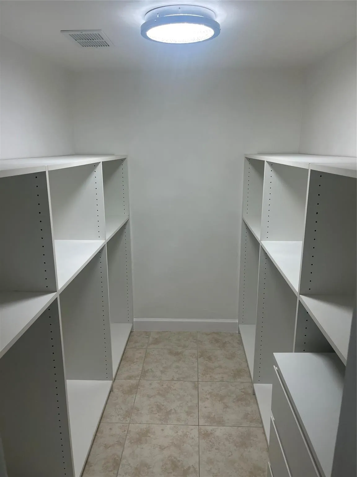 Master Bed Walk In Closet with Shelves