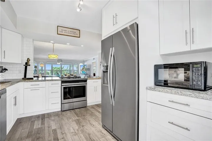 COASTAL LIVING AT ITS BEST FOR BEACH & BOAT LOVERS IN LAUDERDALE BY THE SEA. THIS NICELY REMODELED UNIT FEATURES 1300 SQ FT, 2 BEDROOMS 2 BATHROOMS LOCATED DIRECTLY ON THE CANAL W/ AMAZING WATER VIEWS ONLY 600 FT FROM THE INTRACOASTAL. KITCHEN FEATURES WHITE SHAKER CABINETS, STAINLESS STEEL APPLIANCES W/ GRANITE COUNTERTOPS, & IN UNIT WASHER/ DRYER. PRIMARY BEDROOM ALSO HAS WATER VIEWS W/ WALK IN CUSTOM CALIFORNIA STYLE CLOSET. UPDATED BATHROOMS, NO FIXED BRIDGES, 3 HEATED POOLS, 3 BBQ AREAS, TIKI HUT.