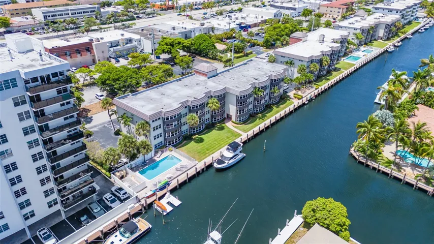 COASTAL LIVING AT ITS BEST FOR BEACH & BOAT LOVERS IN LAUDERDALE BY THE SEA. THIS NICELY REMODELED UNIT FEATURES 1300 SQ FT, 2 BEDROOMS 2 BATHROOMS LOCATED DIRECTLY ON THE CANAL W/ AMAZING WATER VIEWS ONLY 600 FT FROM THE INTRACOASTAL. KITCHEN FEATURES WHITE SHAKER CABINETS, STAINLESS STEEL APPLIANCES W/ GRANITE COUNTERTOPS, & IN UNIT WASHER/ DRYER. PRIMARY BEDROOM ALSO HAS WATER VIEWS W/ WALK IN CUSTOM CALIFORNIA STYLE CLOSET. UPDATED BATHROOMS, NO FIXED BRIDGES, 3 HEATED POOLS, 3 BBQ AREAS, TIKI HUT.