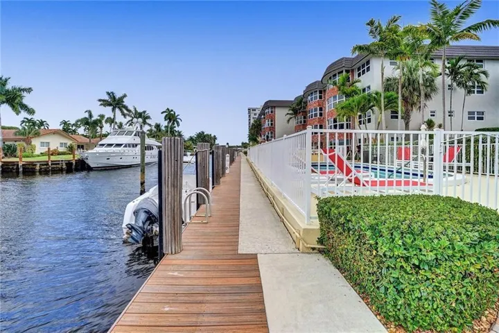 COASTAL LIVING AT ITS BEST FOR BEACH & BOAT LOVERS IN LAUDERDALE BY THE SEA. THIS NICELY REMODELED UNIT FEATURES 1300 SQ FT, 2 BEDROOMS 2 BATHROOMS LOCATED DIRECTLY ON THE CANAL W/ AMAZING WATER VIEWS ONLY 600 FT FROM THE INTRACOASTAL. KITCHEN FEATURES WHITE SHAKER CABINETS, STAINLESS STEEL APPLIANCES W/ GRANITE COUNTERTOPS, & IN UNIT WASHER/ DRYER. PRIMARY BEDROOM ALSO HAS WATER VIEWS W/ WALK IN CUSTOM CALIFORNIA STYLE CLOSET. UPDATED BATHROOMS, NO FIXED BRIDGES, 3 HEATED POOLS, 3 BBQ AREAS, TIKI HUT.