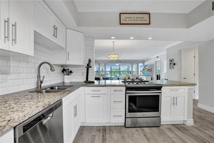 COASTAL LIVING AT ITS BEST FOR BEACH & BOAT LOVERS IN LAUDERDALE BY THE SEA. THIS NICELY REMODELED UNIT FEATURES 1300 SQ FT, 2 BEDROOMS 2 BATHROOMS LOCATED DIRECTLY ON THE CANAL W/ AMAZING WATER VIEWS ONLY 600 FT FROM THE INTRACOASTAL. KITCHEN FEATURES WHITE SHAKER CABINETS, STAINLESS STEEL APPLIANCES W/ GRANITE COUNTERTOPS, & IN UNIT WASHER/ DRYER. PRIMARY BEDROOM ALSO HAS WATER VIEWS W/ WALK IN CUSTOM CALIFORNIA STYLE CLOSET. UPDATED BATHROOMS, NO FIXED BRIDGES, 3 HEATED POOLS, 3 BBQ AREAS, TIKI HUT.