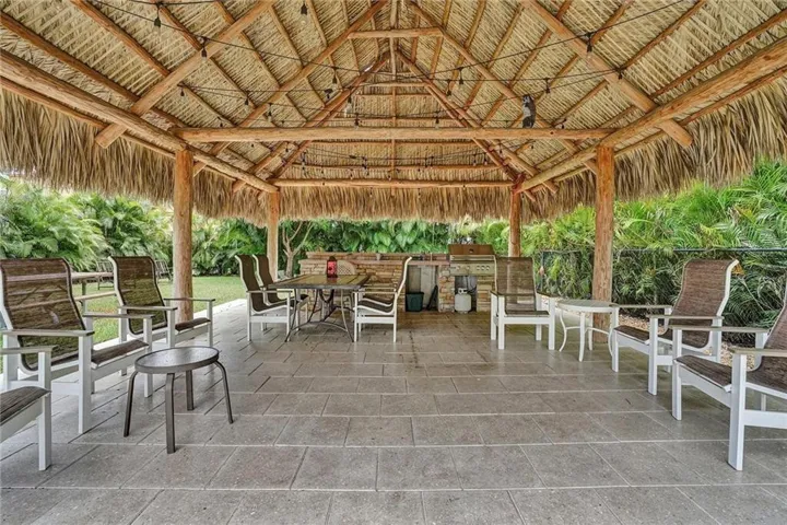 COASTAL LIVING AT ITS BEST FOR BEACH & BOAT LOVERS IN LAUDERDALE BY THE SEA. THIS NICELY REMODELED UNIT FEATURES 1300 SQ FT, 2 BEDROOMS 2 BATHROOMS LOCATED DIRECTLY ON THE CANAL W/ AMAZING WATER VIEWS ONLY 600 FT FROM THE INTRACOASTAL. KITCHEN FEATURES WHITE SHAKER CABINETS, STAINLESS STEEL APPLIANCES W/ GRANITE COUNTERTOPS, & IN UNIT WASHER/ DRYER. PRIMARY BEDROOM ALSO HAS WATER VIEWS W/ WALK IN CUSTOM CALIFORNIA STYLE CLOSET. UPDATED BATHROOMS, NO FIXED BRIDGES, 3 HEATED POOLS, 3 BBQ AREAS, TIKI HUT.