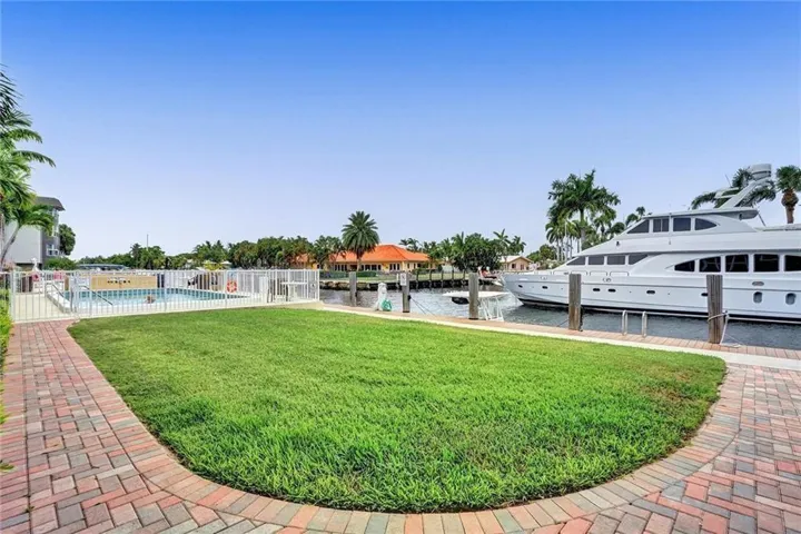 COASTAL LIVING AT ITS BEST FOR BEACH & BOAT LOVERS IN LAUDERDALE BY THE SEA. THIS NICELY REMODELED UNIT FEATURES 1300 SQ FT, 2 BEDROOMS 2 BATHROOMS LOCATED DIRECTLY ON THE CANAL W/ AMAZING WATER VIEWS ONLY 600 FT FROM THE INTRACOASTAL. KITCHEN FEATURES WHITE SHAKER CABINETS, STAINLESS STEEL APPLIANCES W/ GRANITE COUNTERTOPS, & IN UNIT WASHER/ DRYER. PRIMARY BEDROOM ALSO HAS WATER VIEWS W/ WALK IN CUSTOM CALIFORNIA STYLE CLOSET. UPDATED BATHROOMS, NO FIXED BRIDGES, 3 HEATED POOLS, 3 BBQ AREAS, TIKI HUT.