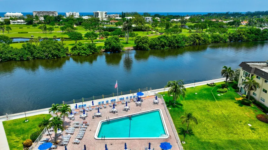 Waterfront pool with views of the golf club