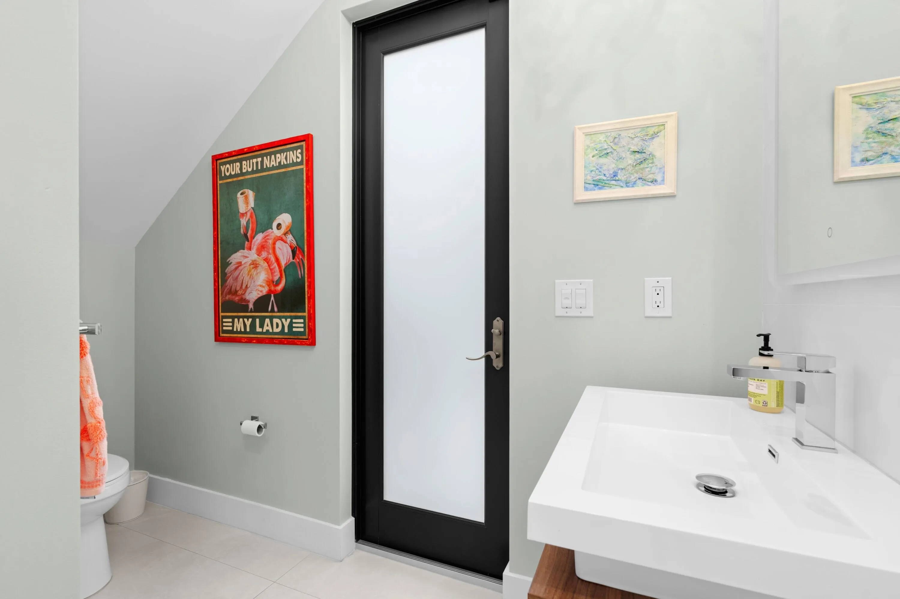 1st Floor Powder Room below staircase