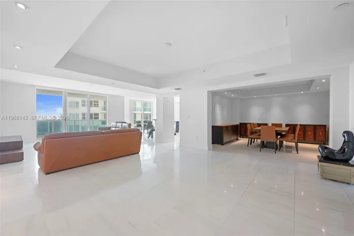 Living Room, Formal Dining, + a separate Florida Room/Den