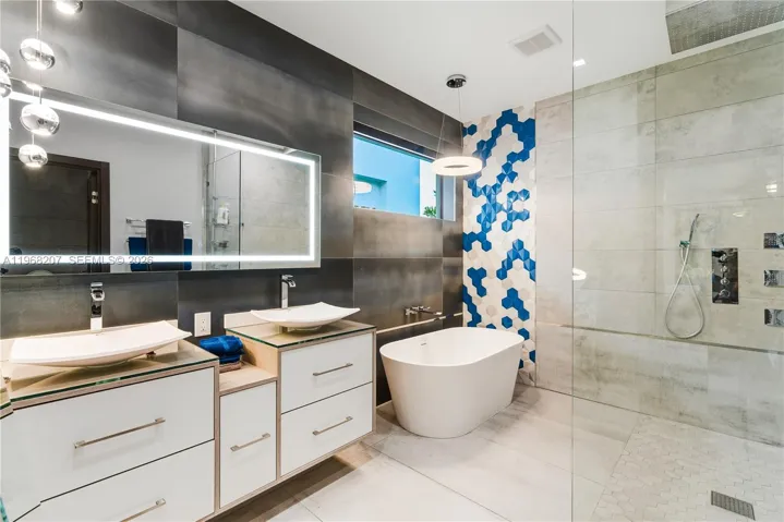 Primary Bathroom with Stone Soaking tub