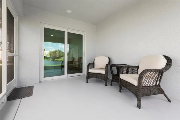 Extend your living space outdoors with a screened lanai overlooking the lake—the perfect spot for morning coffee, evening sunsets, or simply unwinding.