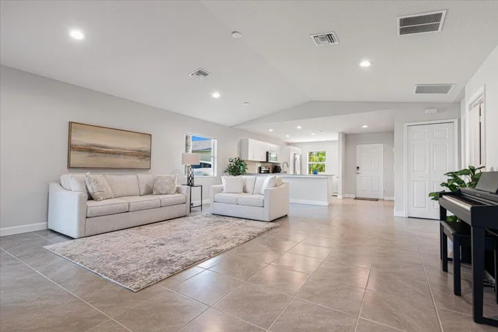 Spacious open-concept design with soaring ceilings and seamless flow throughout the home.