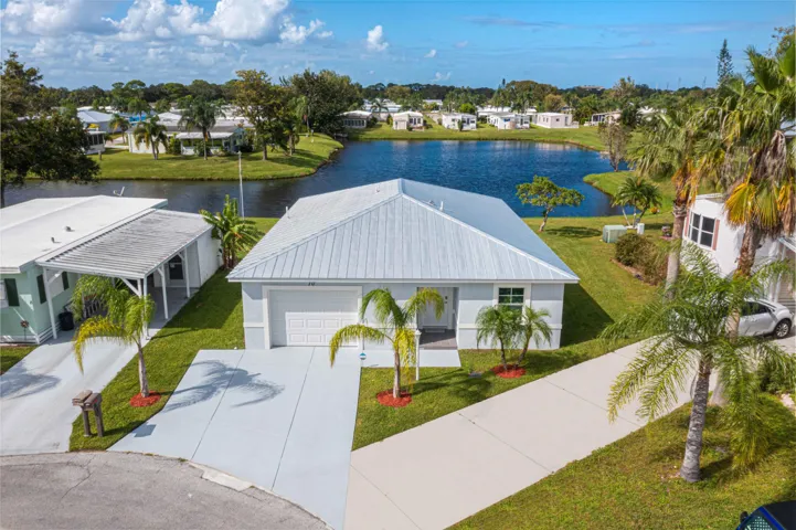 Enjoy one of the community's most desirable waterfront locations with expansive views.