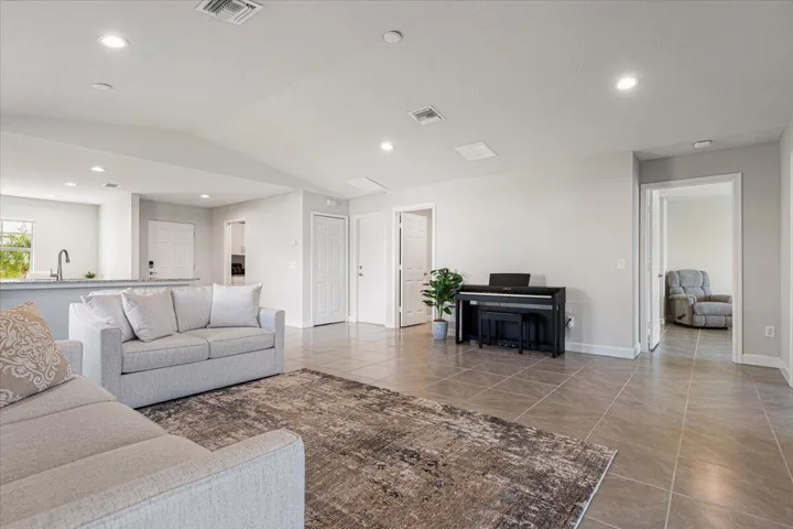 Extra recessed lighting fills the living spaces with natural-looking brightness, making every room feel warm, open, and inviting.