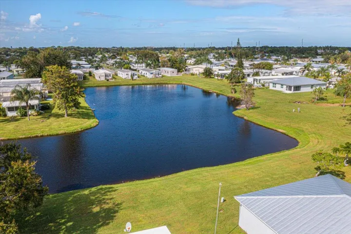 Relax every day overlooking a tranquil lake just steps from your backyard.