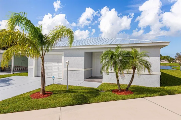 Covered entrance welcomes family and guests into this move-in ready home.