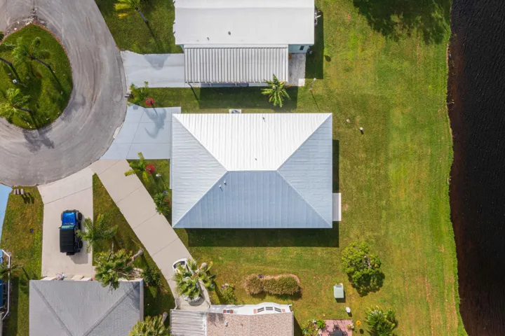 See how this home sits in a quiet cul-de-sac surrounded by well-kept residences.