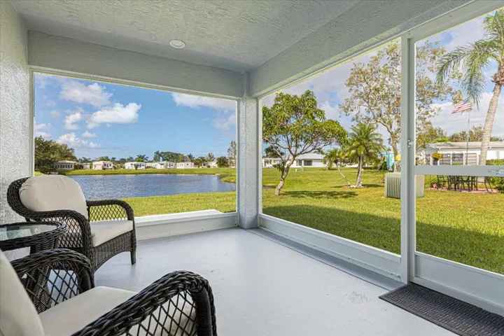 Start your day with morning coffee from the screened patio overlooking the water.
