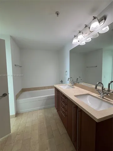 Master bathroom has separated bathtub and shower