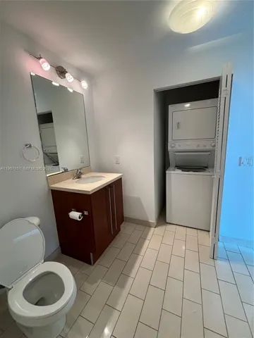 Second bathroom has a closet with the washer and dryer