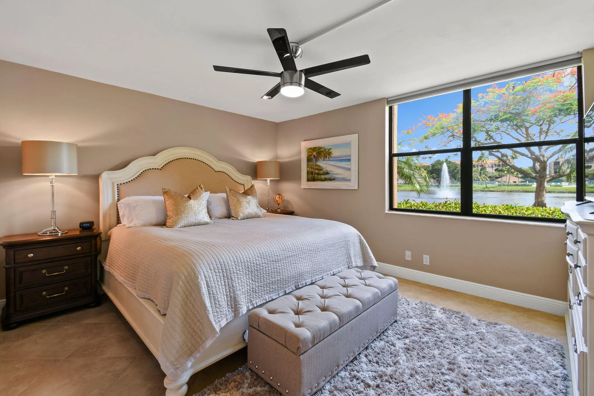 PRIMARY SUITE WITH DESIGNER BEDDING & TOP QUALITY FURNISHINGS & BEAUTIFUL LAKE VIEWS