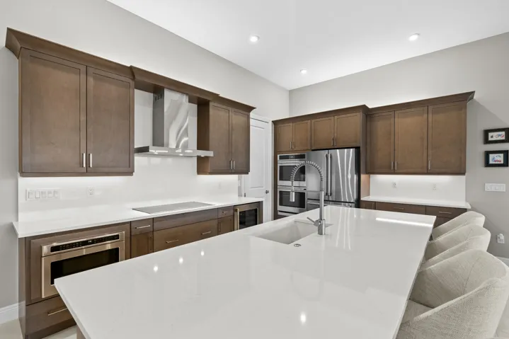 Quartz countertop with matching quartz backsplash