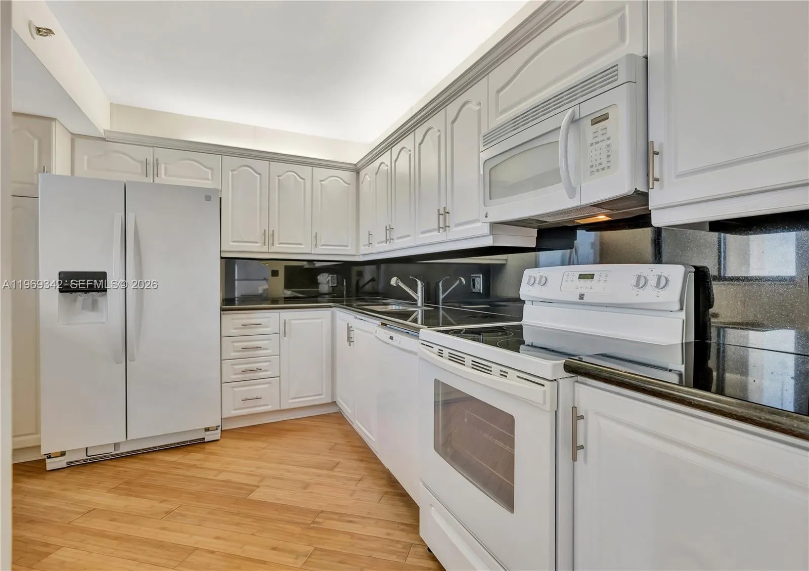White cabinets, Absolute Black granite, Bamboo floors