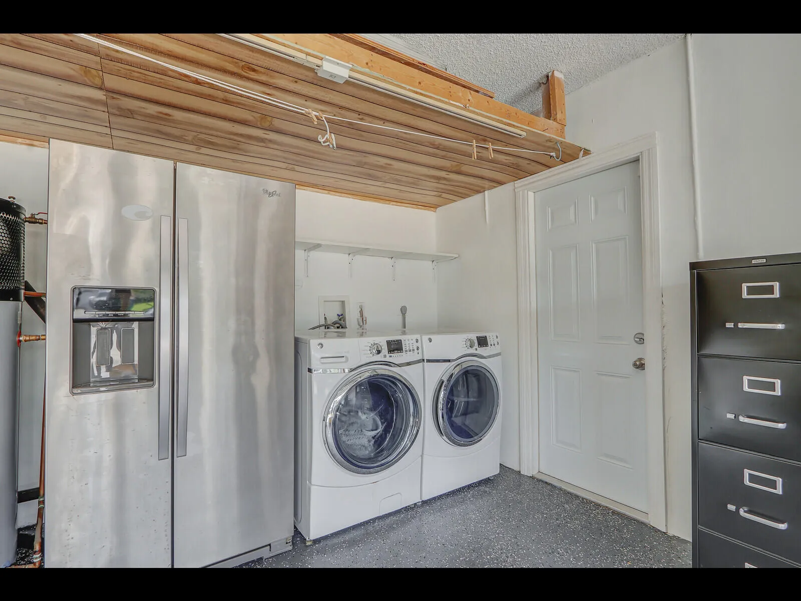 Washer and dryer and second refrigerator