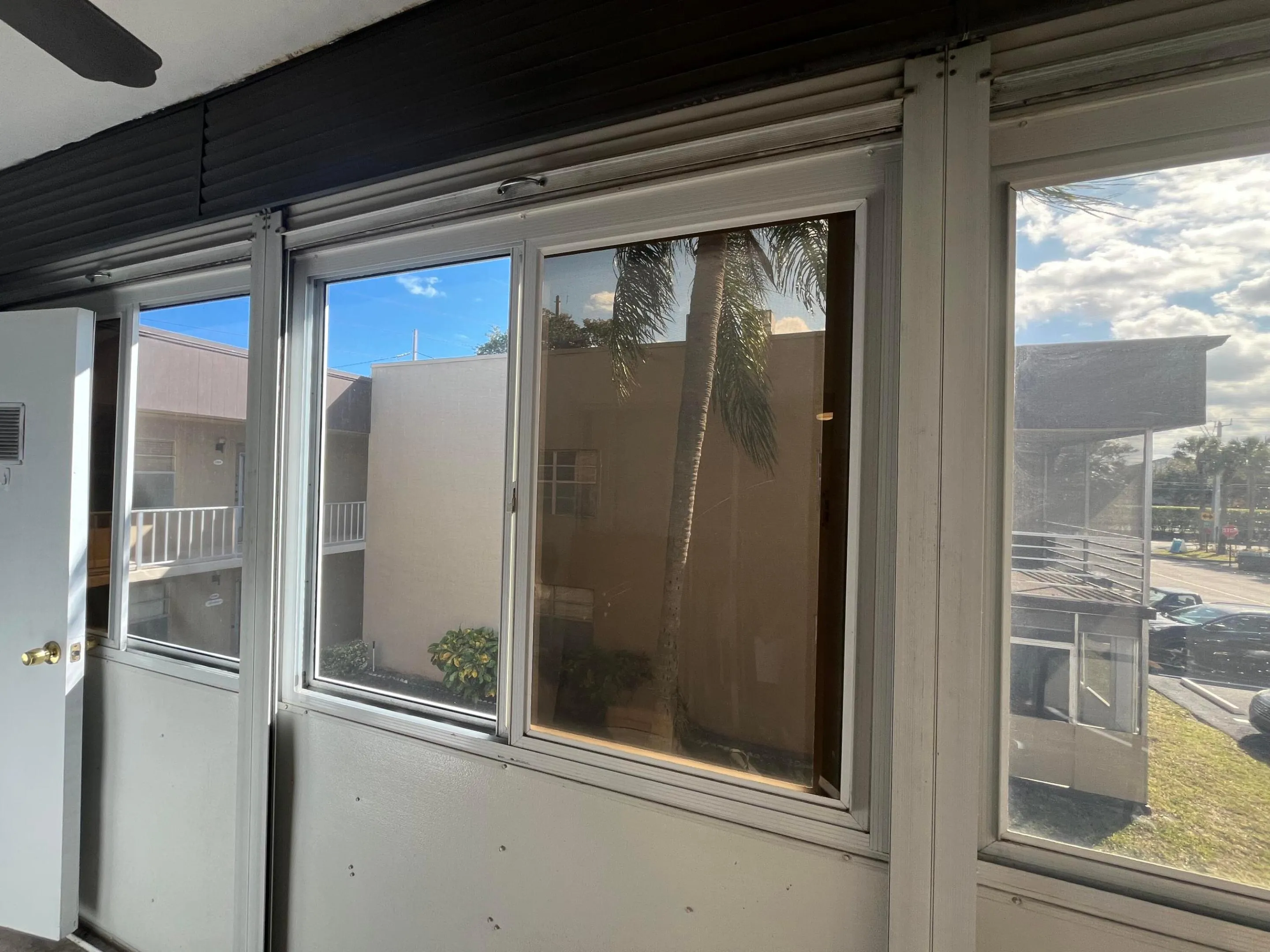 slider upper windows on the enclosed patio