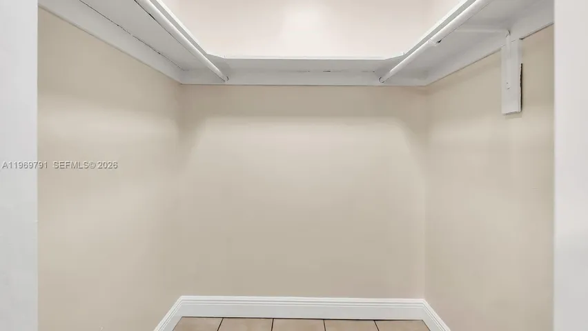 WALK-IN CLOSET PRIMARY BEDROOM