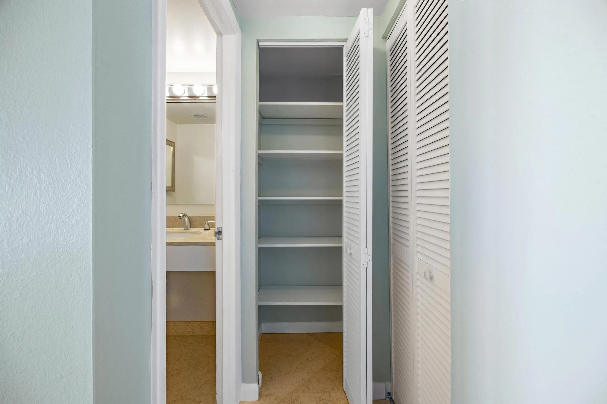 CLOSET BY HALF BATHROOM