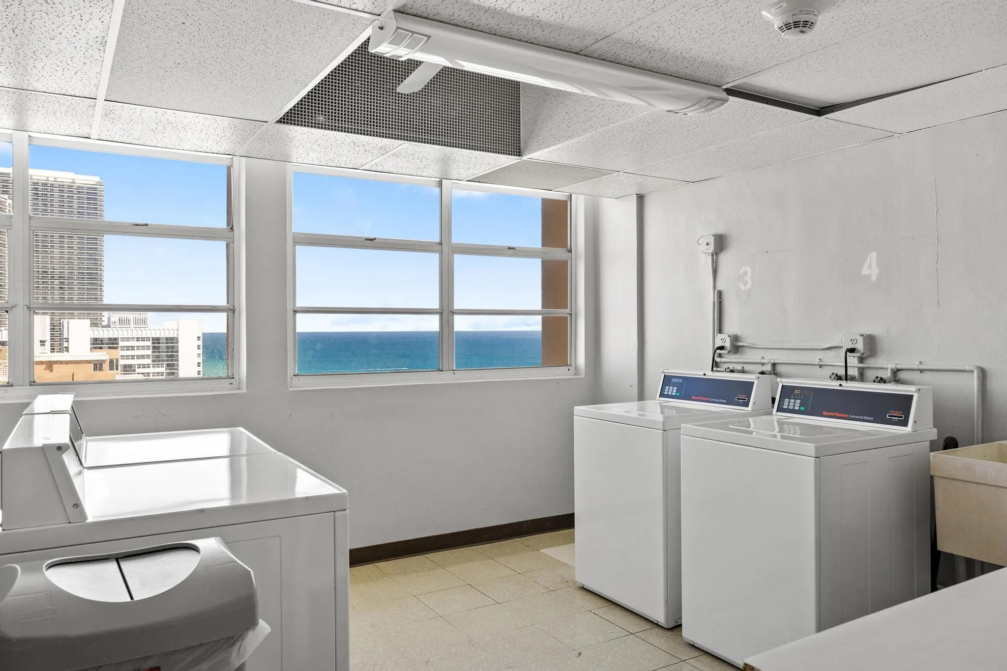 COMMUNITY LAUNDRY ROOM W/ OCEAN VIEW