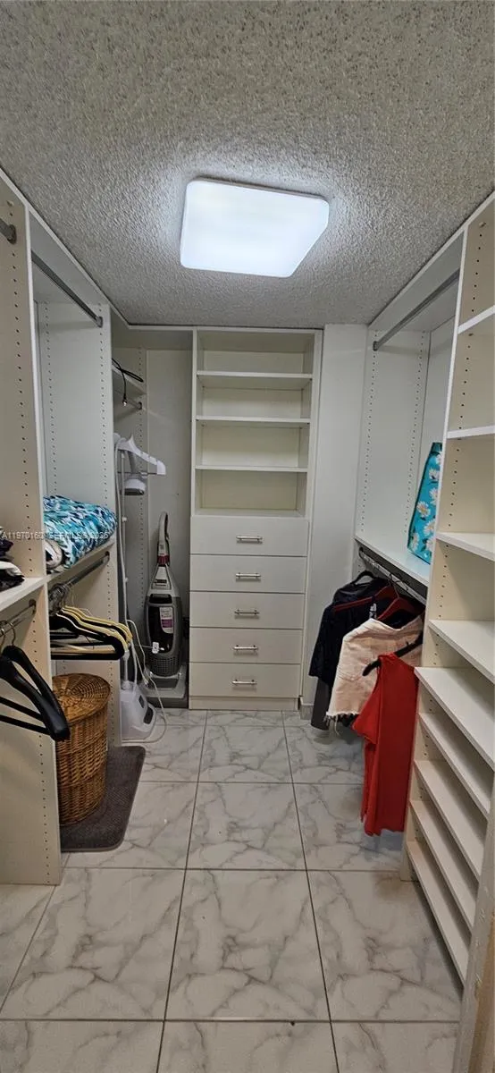 MAIN WALK- IN CLOSET