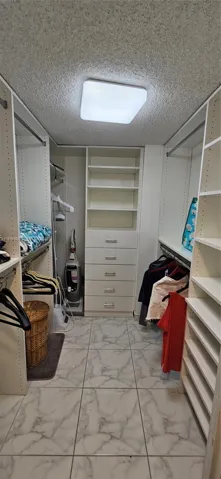 MAIN WALK- IN CLOSET