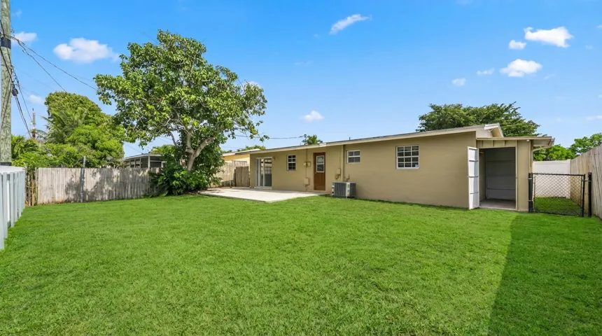 Rear of home & Oversized Backyard!