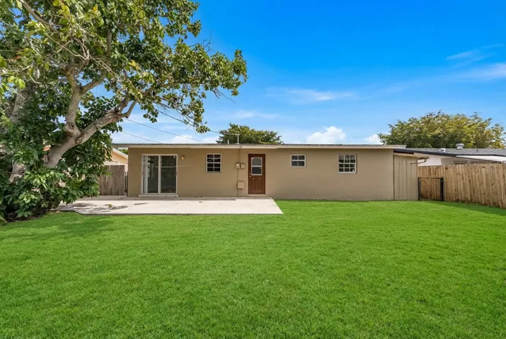 Rear of home & Oversized Backyard!