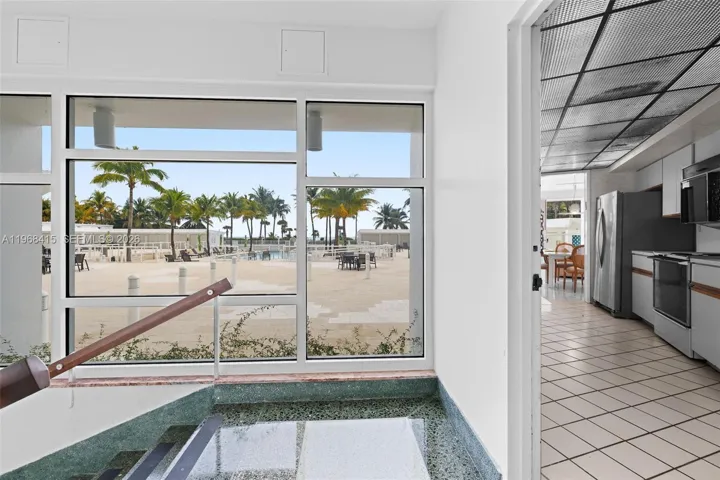 Second Entry Through Kitchen Directly To Pool