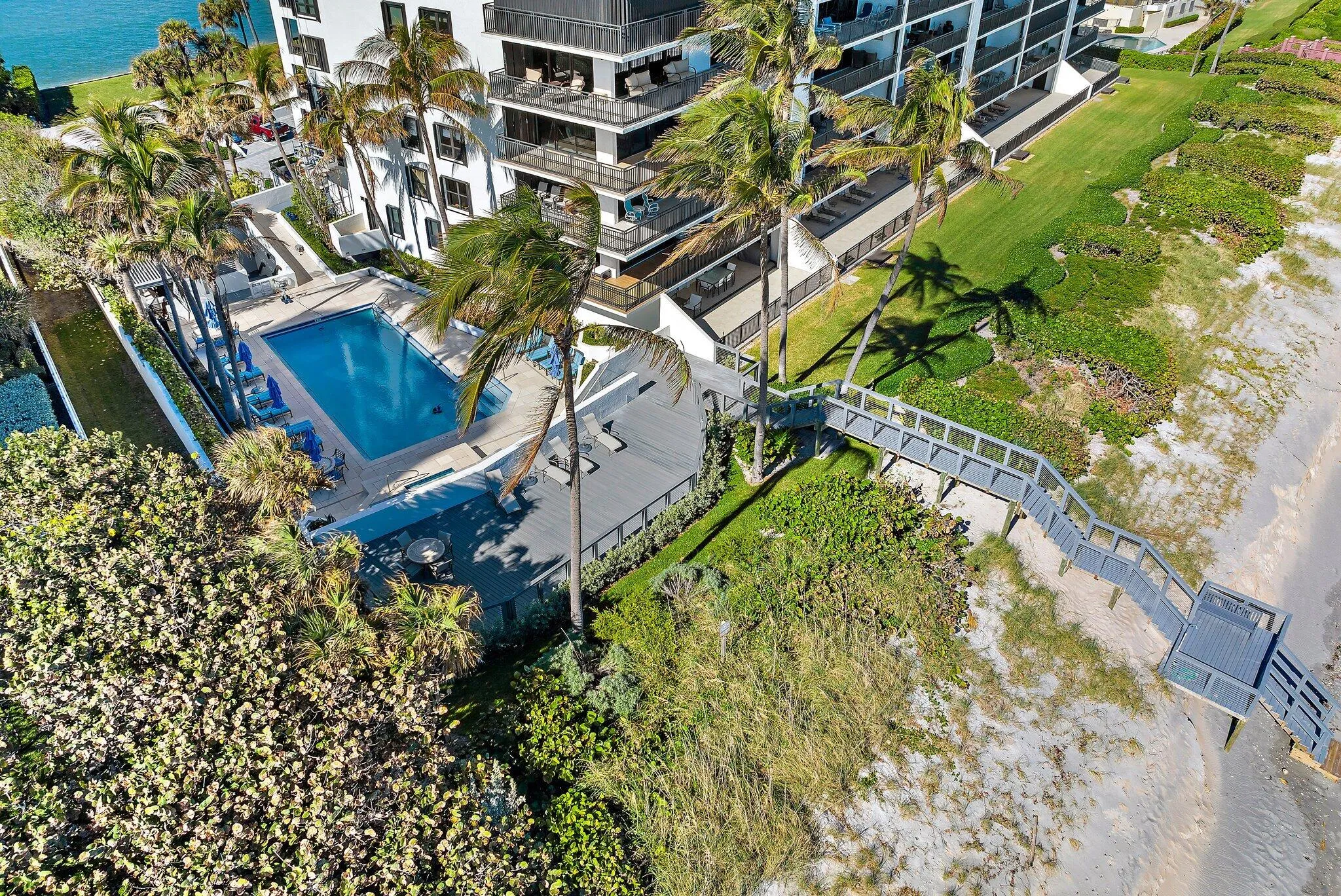 Condo pool and private beach access