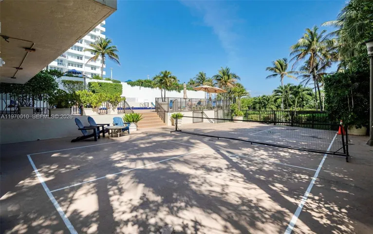 Pickle-ball yard, pool area and garden