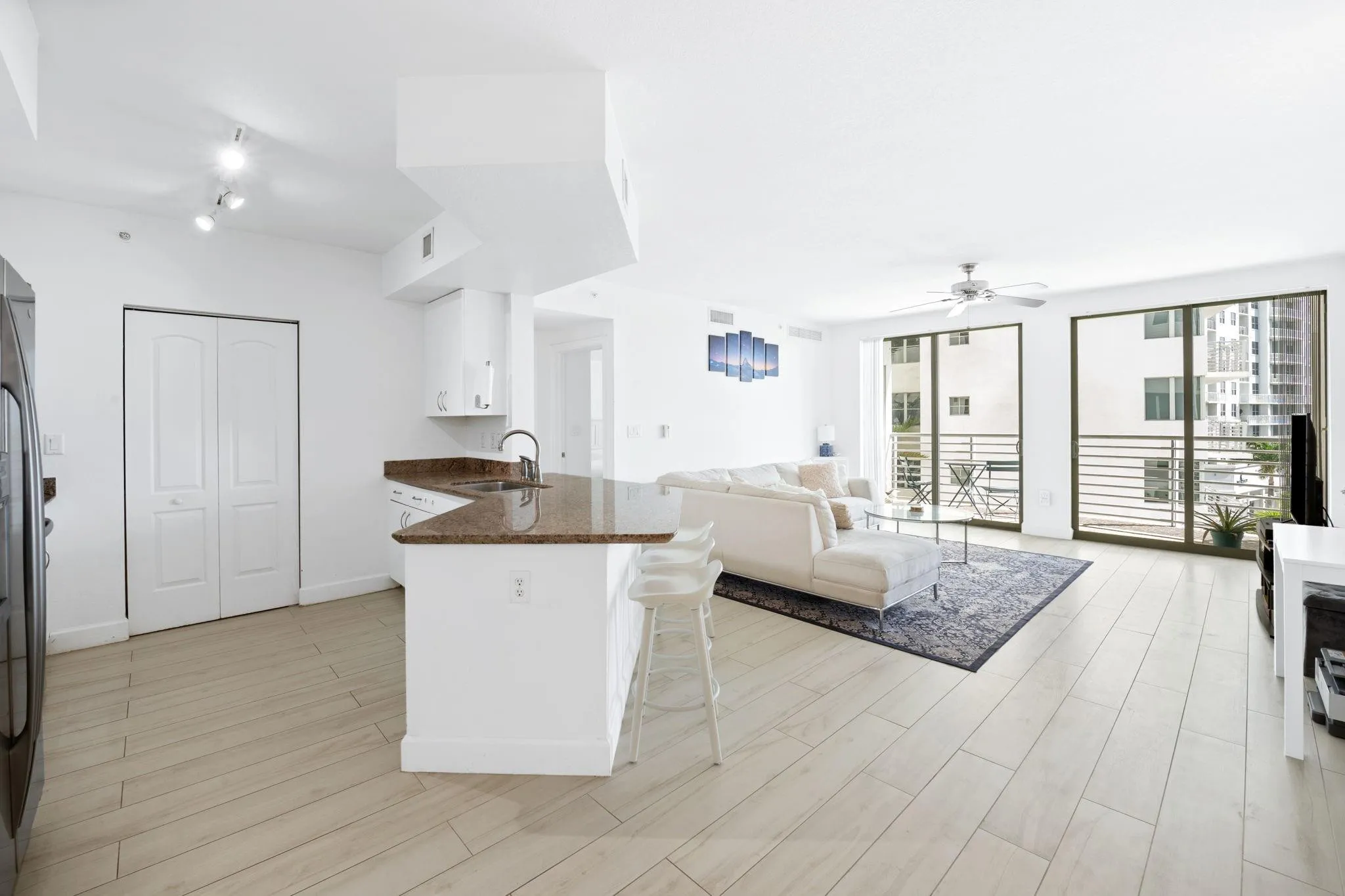 Kitchen opens up into the living area
