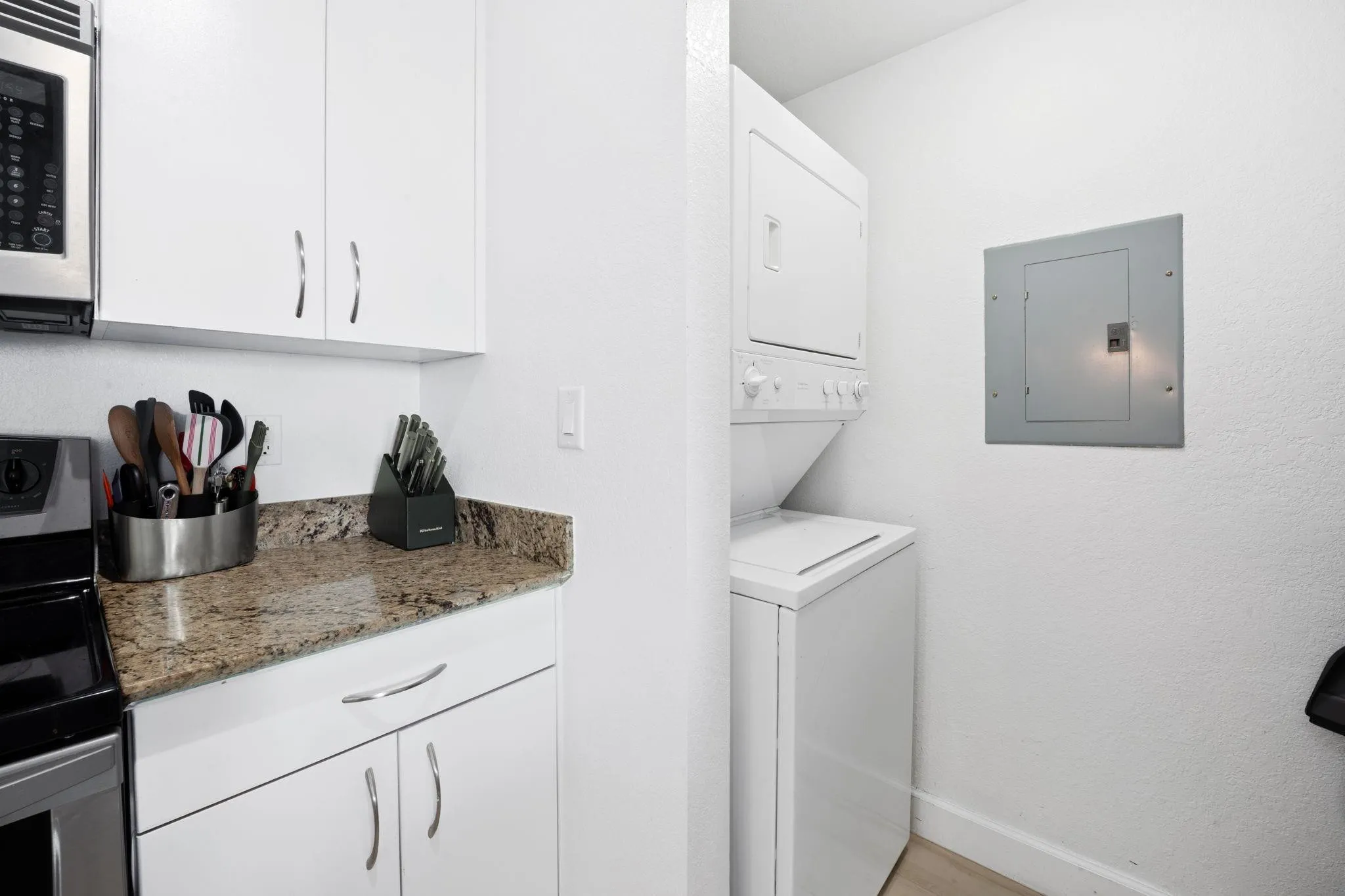 Full sized laundry room off of the kitchen