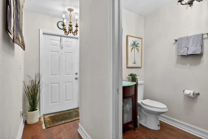 View of Entry & 1/2 Bath/Laundry Closet