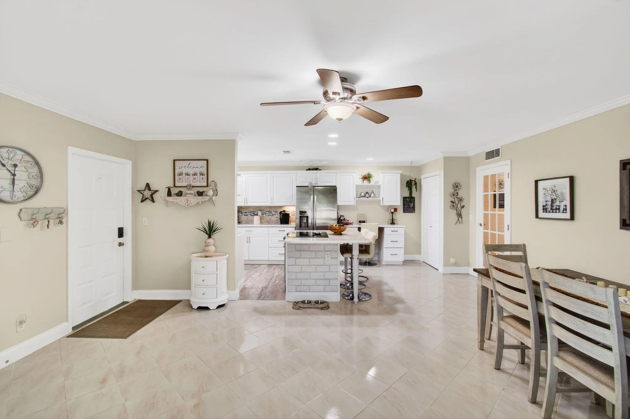 Open concept kitchen and dining area vie