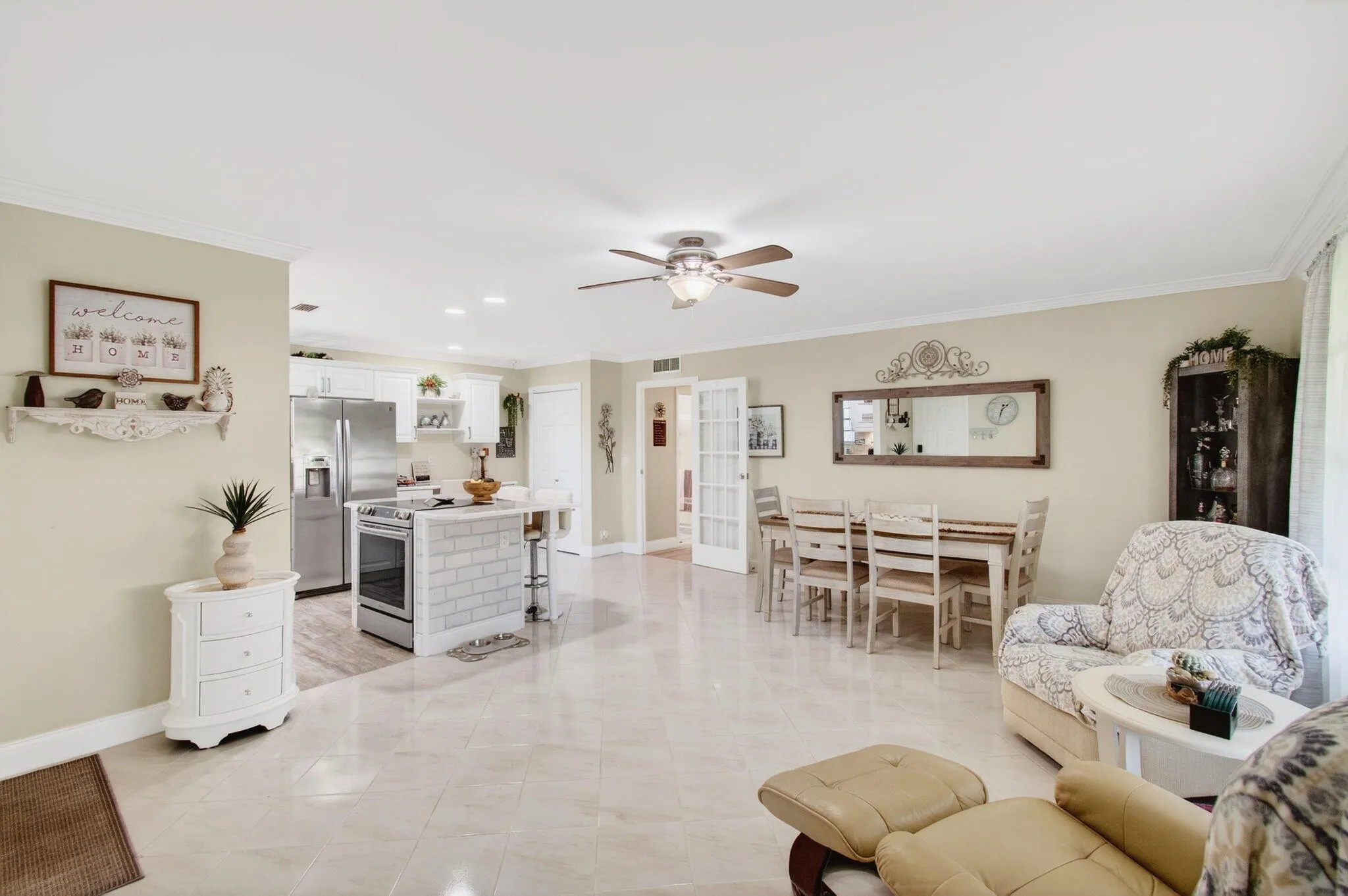 Open concept kitchen and dining area vie
