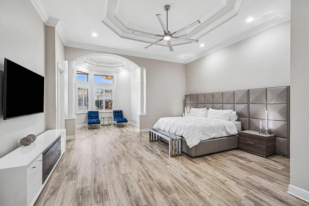 First Expansive Floor Primary Bedroom with two en- suite Baths
