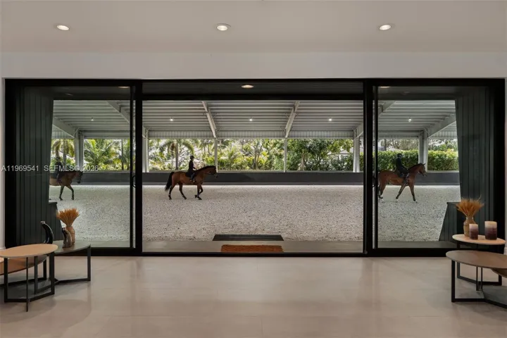 View from inside the clubhouse looking out to the covered arena.