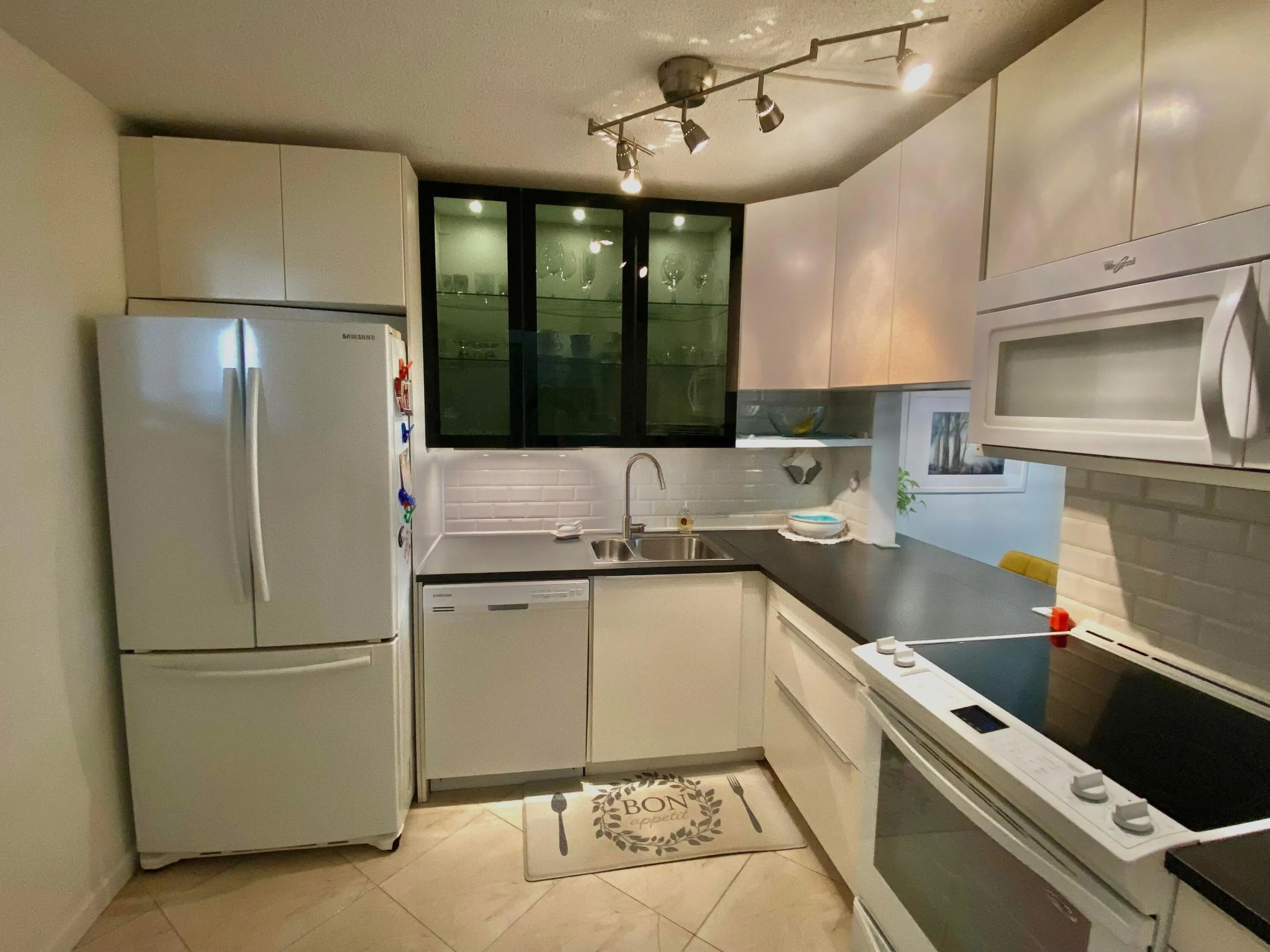 Modern updated kitchen with matching Samsung appliances