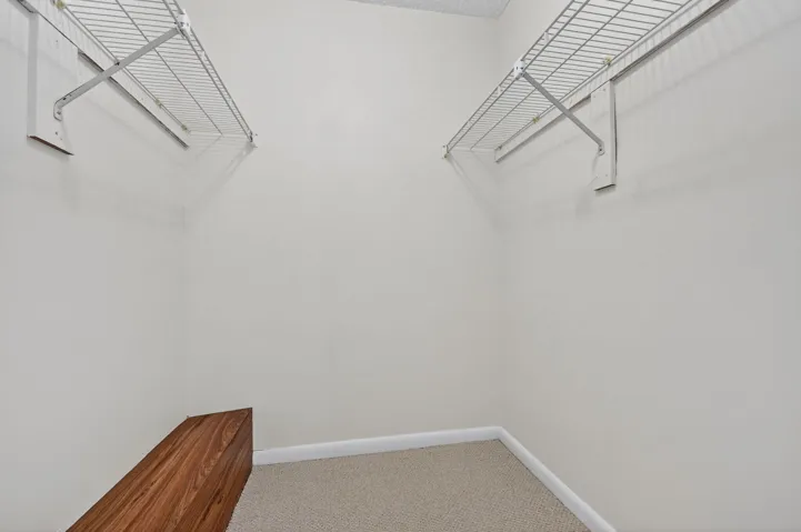 Spacious walk-in closet in primary bedroom